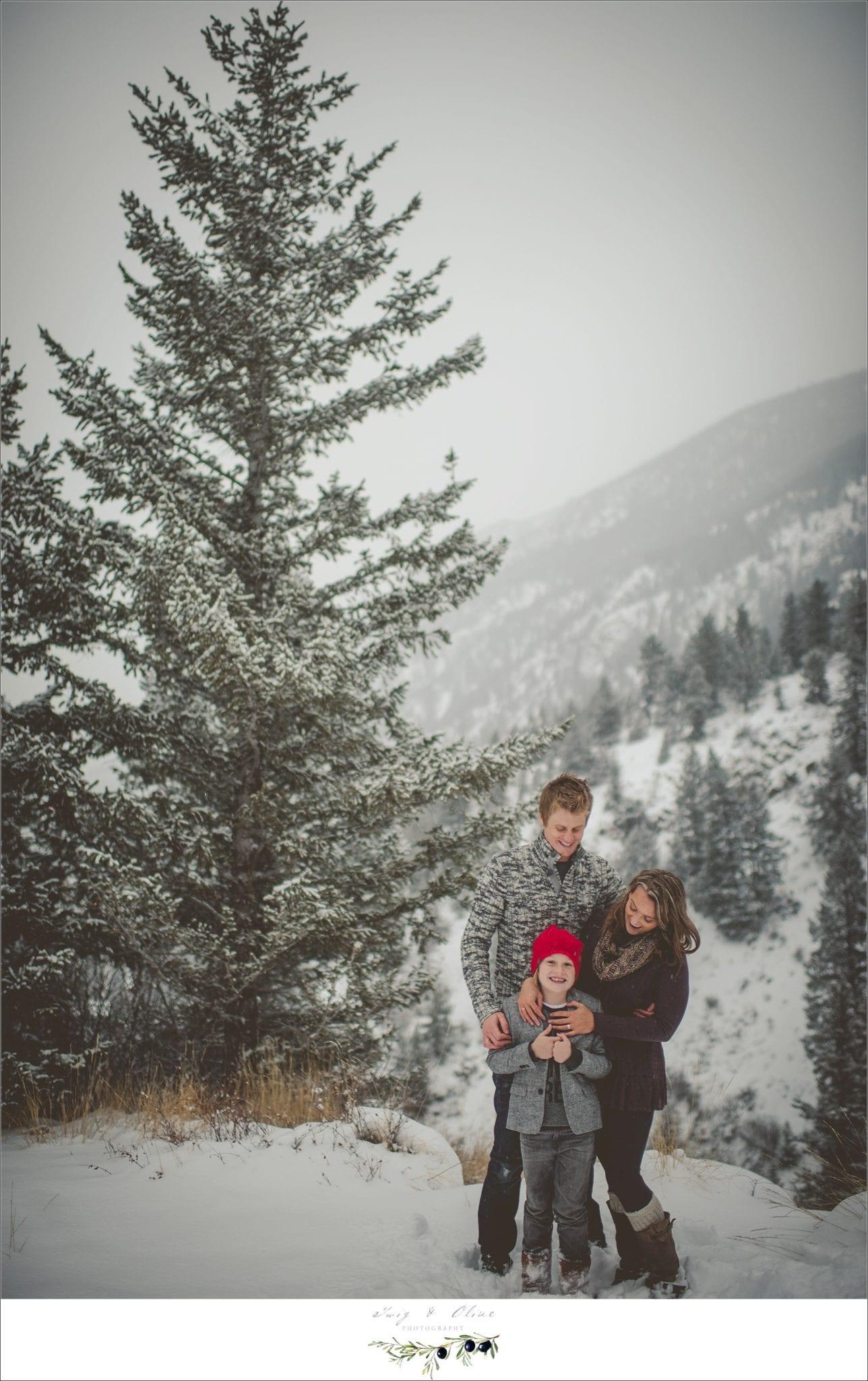 happy family session, snowy colorado day, trees, beautiful backdrop