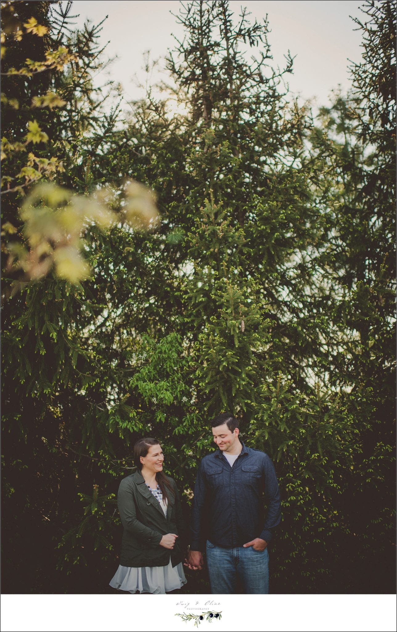 Fort Wayne backdrop, trees, happy couples