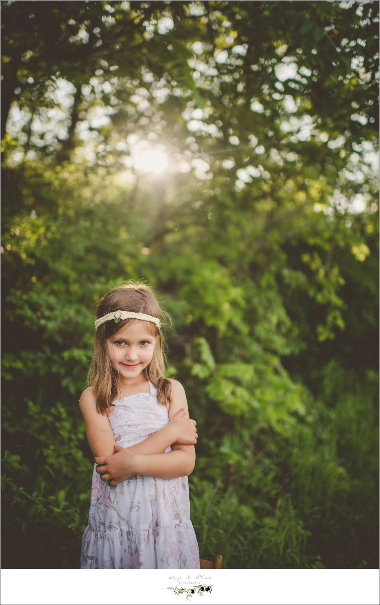 big sister, watchful eye, hair flowers, greenery, rustic, outdoor, Twig and Olive family sessions