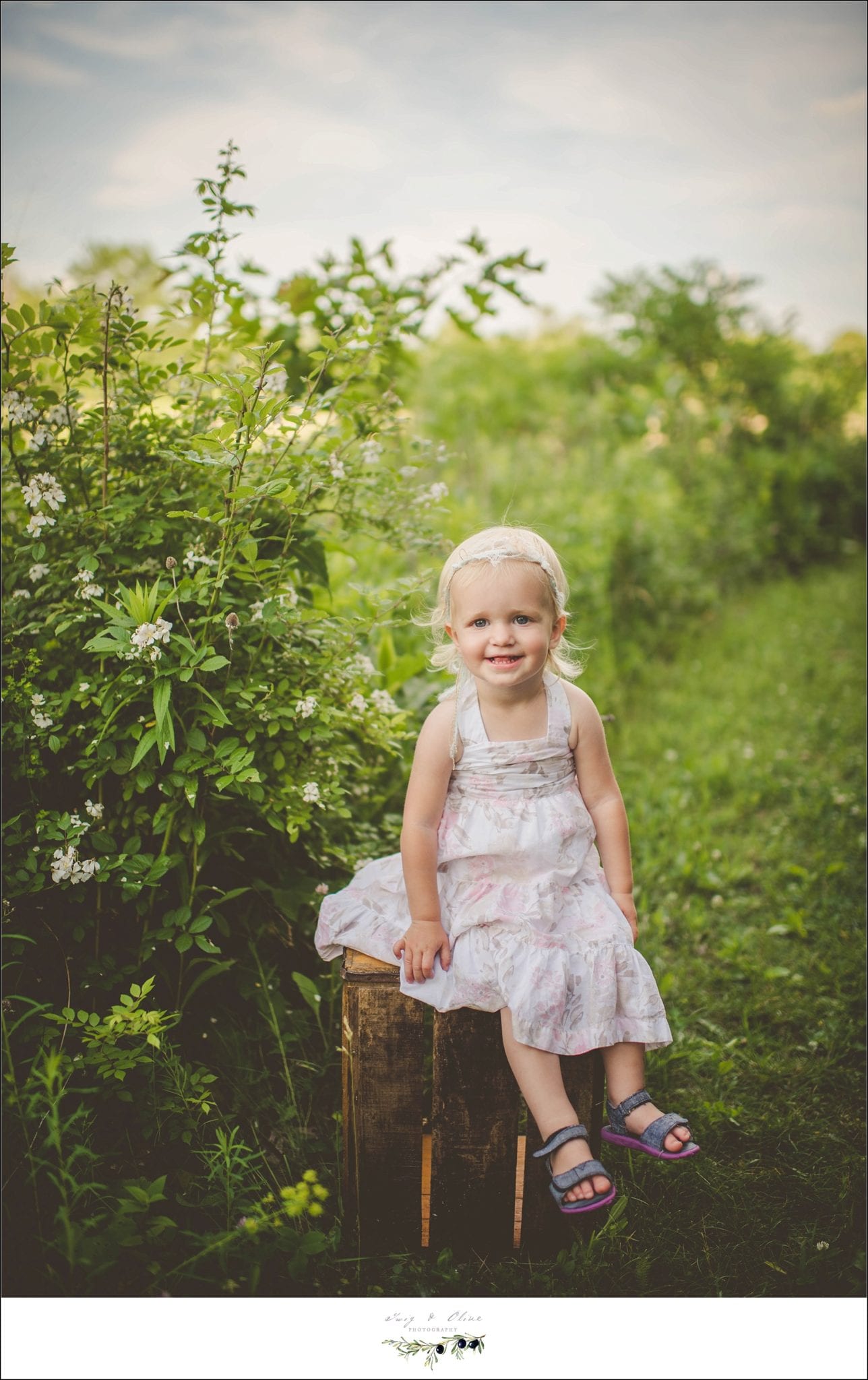 little sister, energetic, full of fun, happy, hair flowers, vintage, rustic, outdoorsy, greenery, white dress, twig and Olive photography