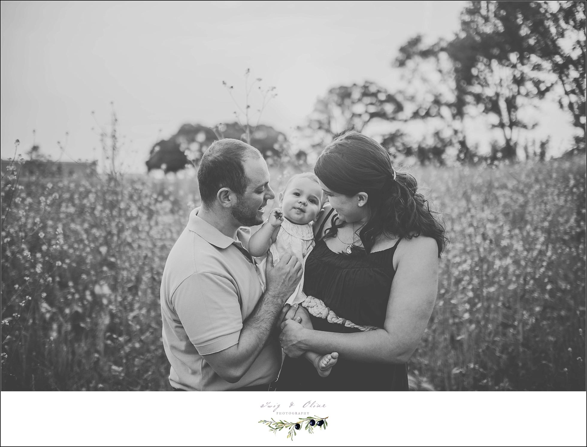 black and white classic image, parents, baby