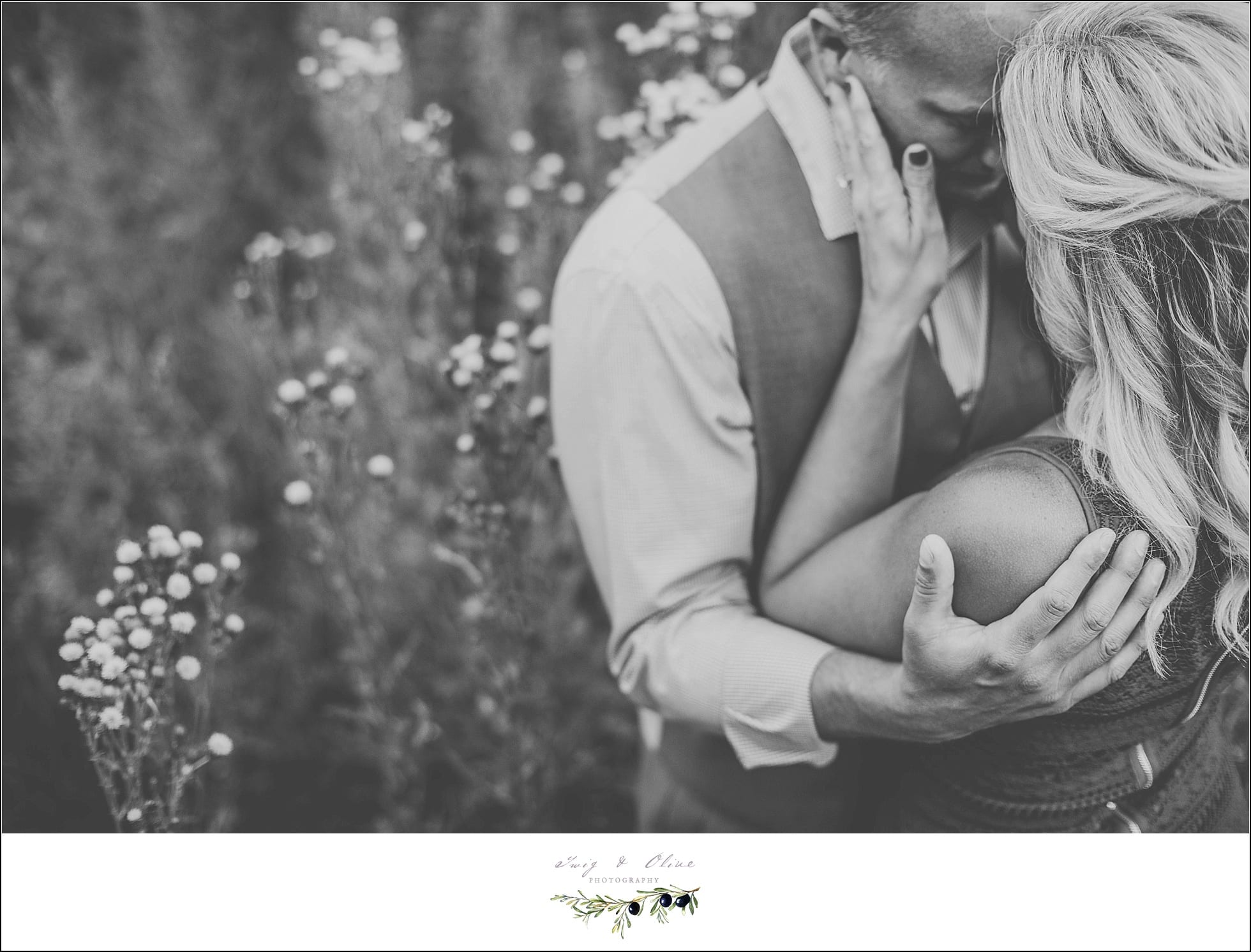 black and white engagement sessions, flowers, greenery, Rustic Manor Delafield WI, happy couple