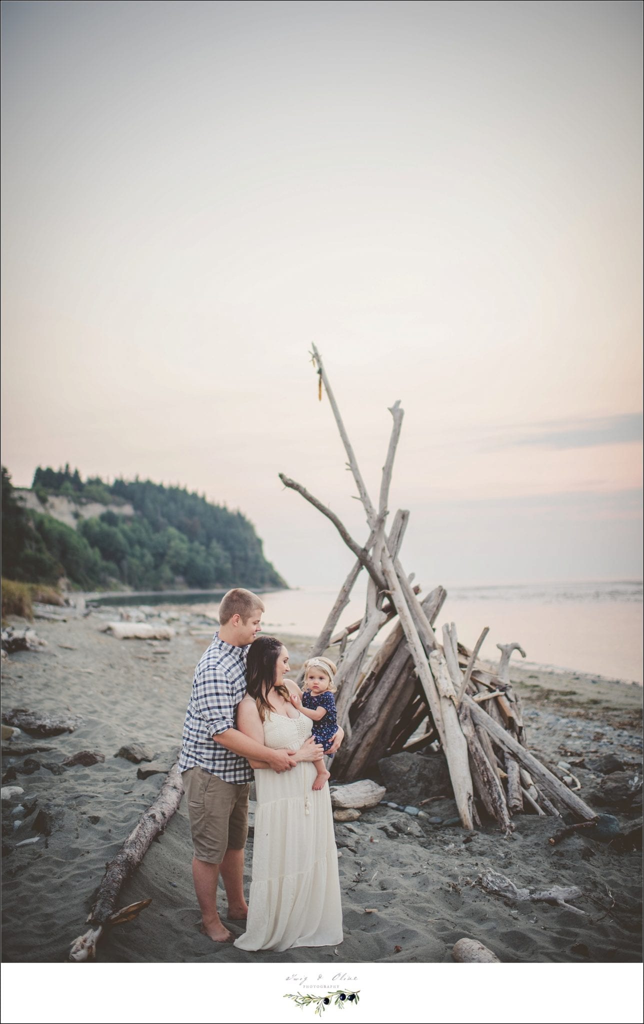 loving embrace in front of beach teepee